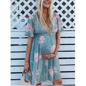 Knee length maternity dress.